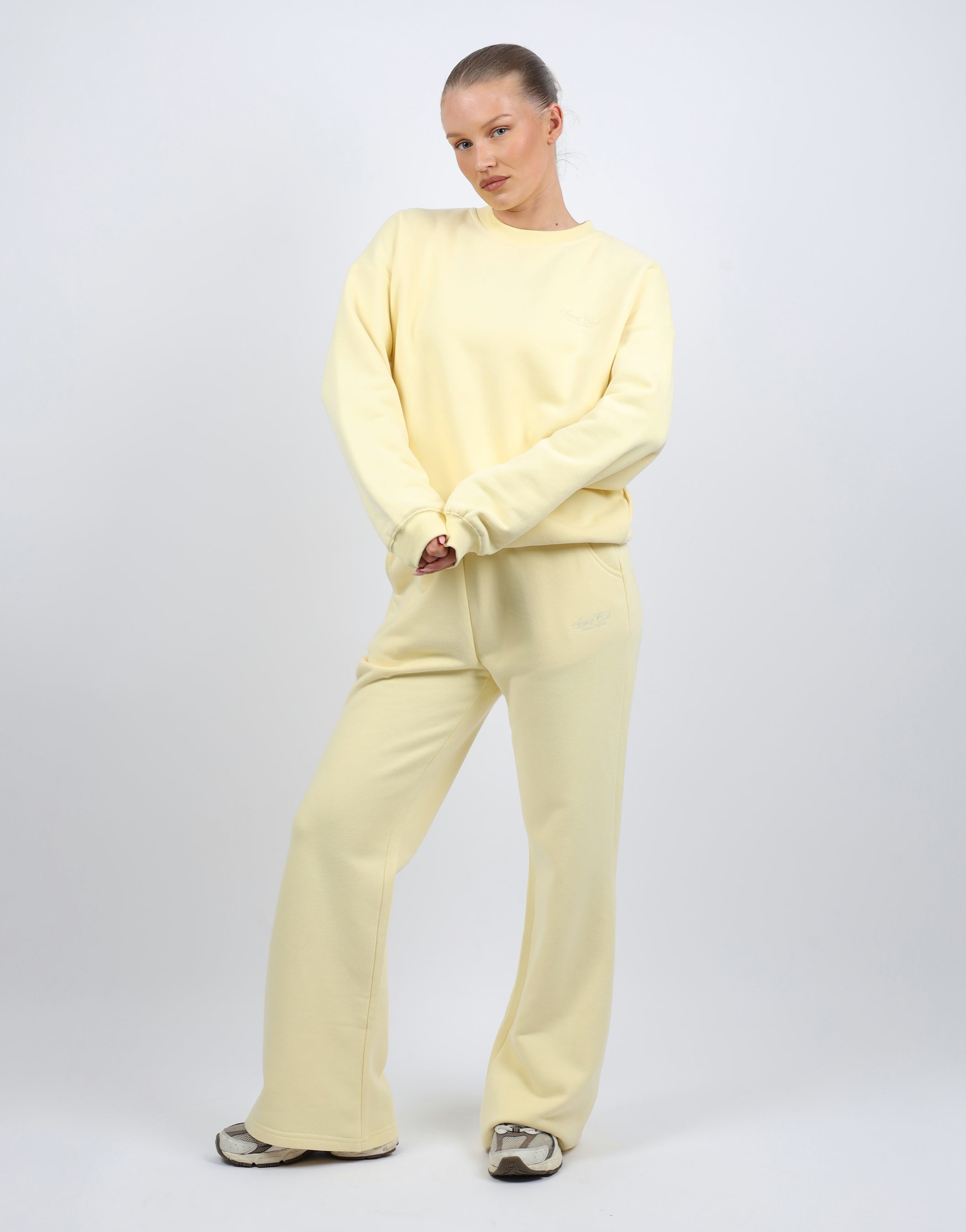 Rue Simmi Studios Embroidered Logo Sweatshirt In Yellow