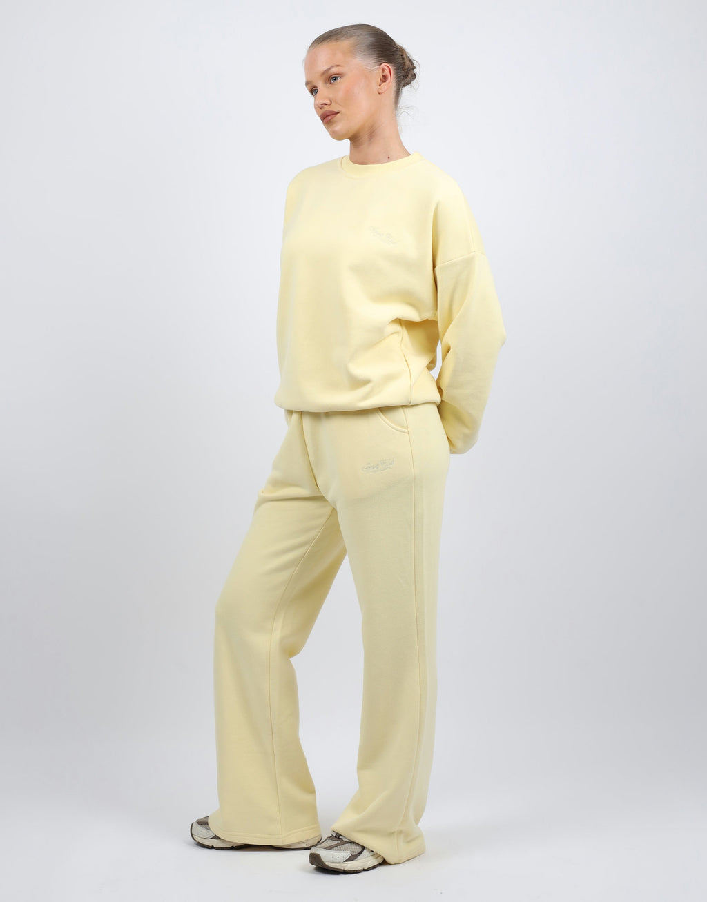 Rue Simmi Studios Embroidered Logo Sweatshirt In Yellow