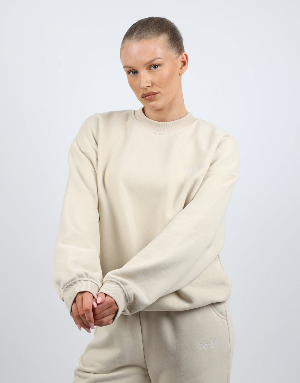Rue Simmi Studios Embroidered Logo Sweatshirt In Beige