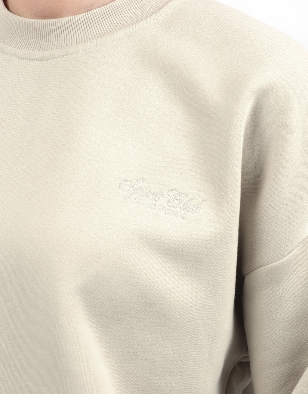 Rue Simmi Studios Embroidered Logo Sweatshirt In Beige