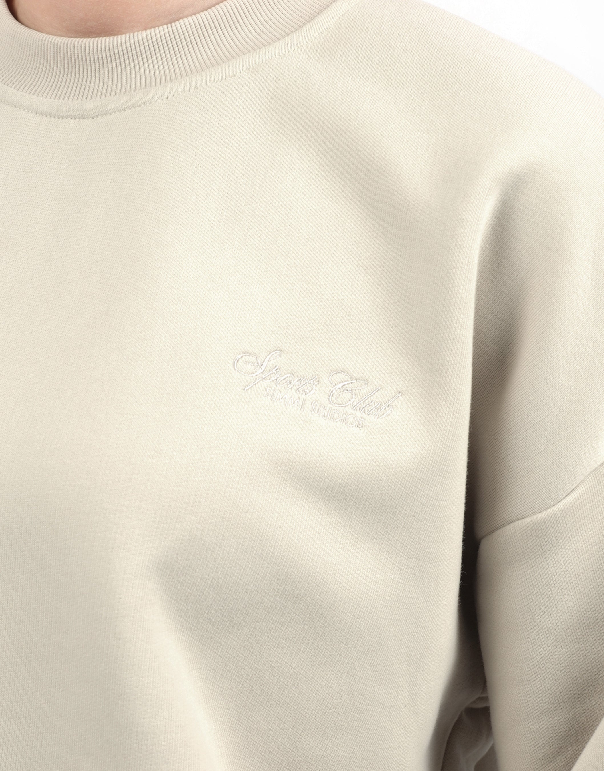 Rue Simmi Studios Embroidered Logo Sweatshirt In Beige