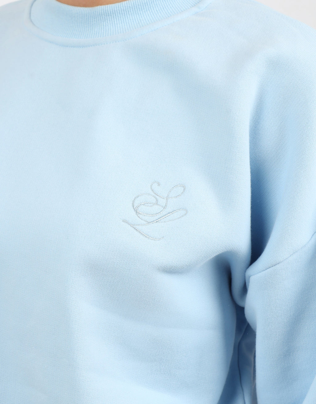 Cove Simmi Studios Embroidered Logo Sweatshirt In Blue