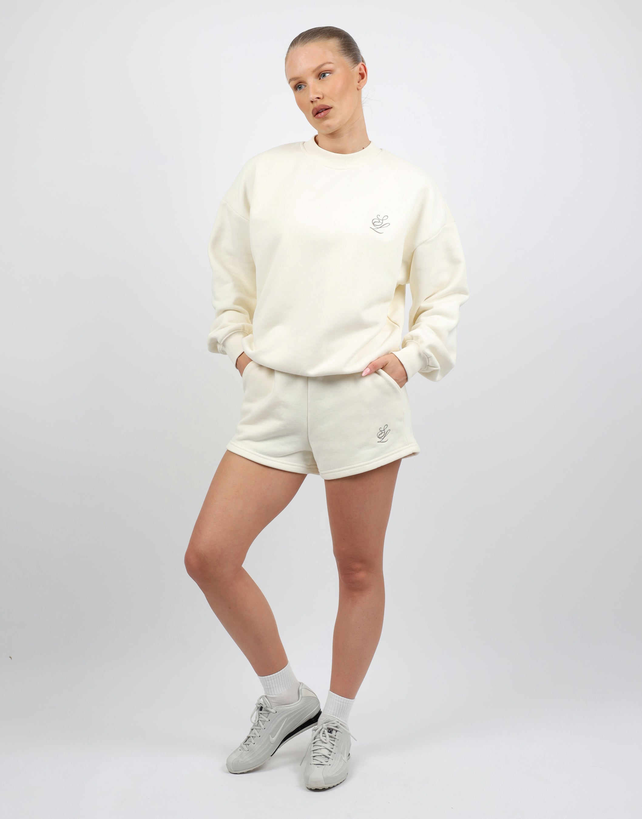 Cove Simmi Studios Embroidered Logo Sweatshirt In Cream