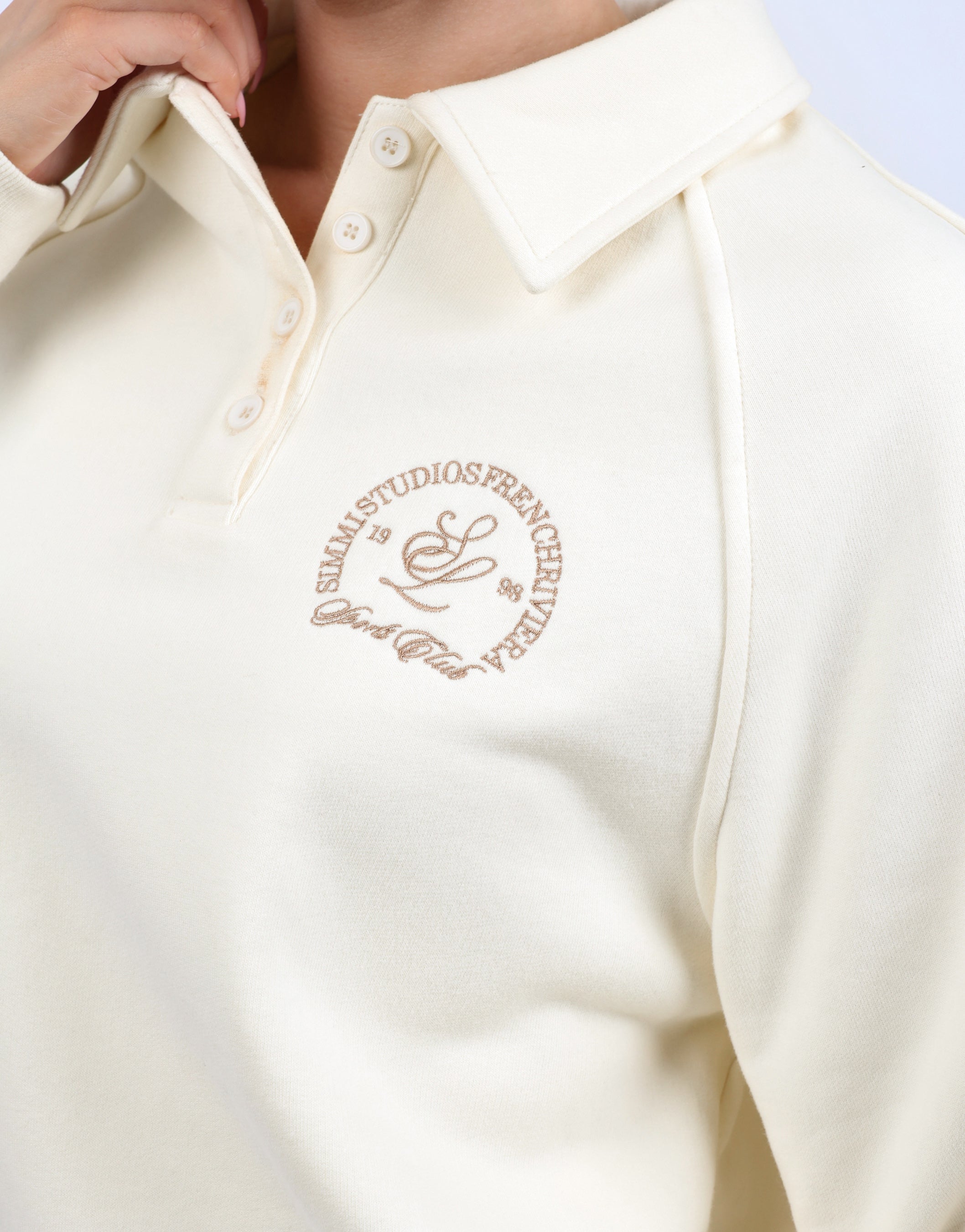 Monaco Simmi Studios Embroidered Logo Polo Sweatshirt In Cream