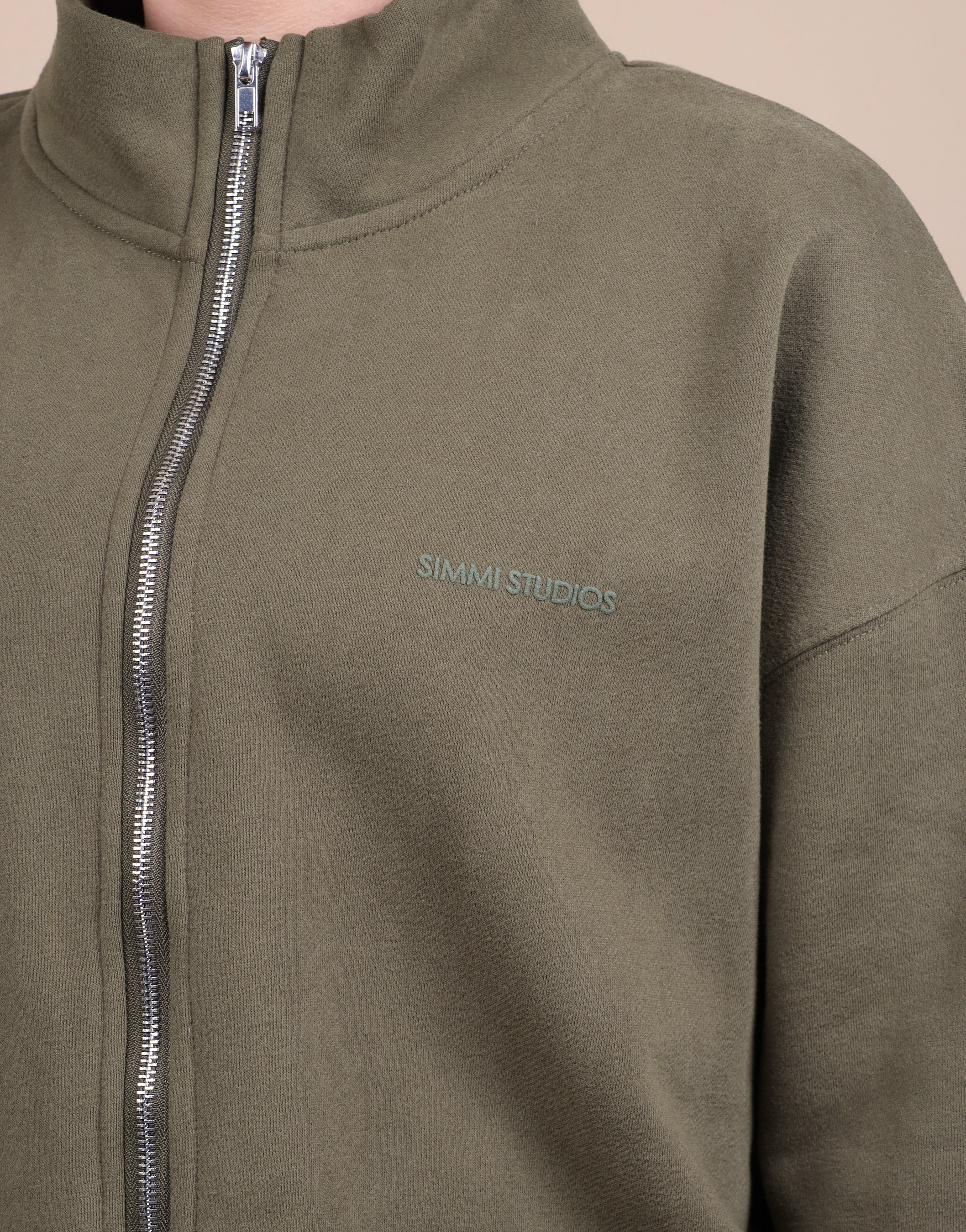 Bronte Simmi Studios Zip Through Funnel Neck Sweatshirt In Olive