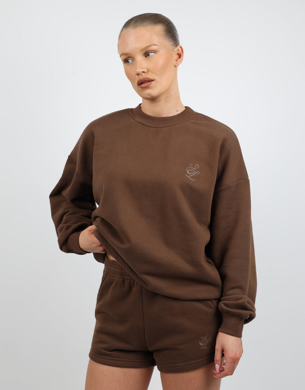 Cove Simmi Studios Embroidered Logo Sweatshirt In Brown
