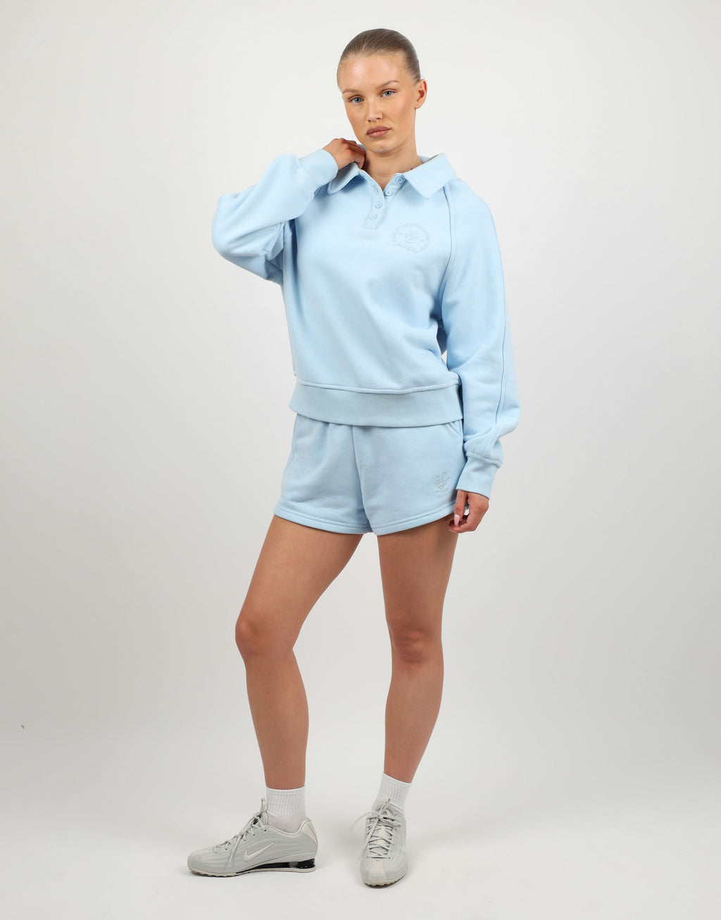 Monaco Simmi Studios Embroidered Logo Polo Sweatshirt In Baby Blue