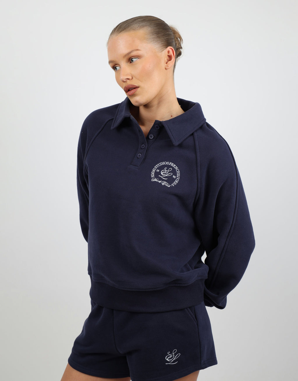 Monaco Simmi Studios Embroidered Logo Polo Sweatshirt In Navy