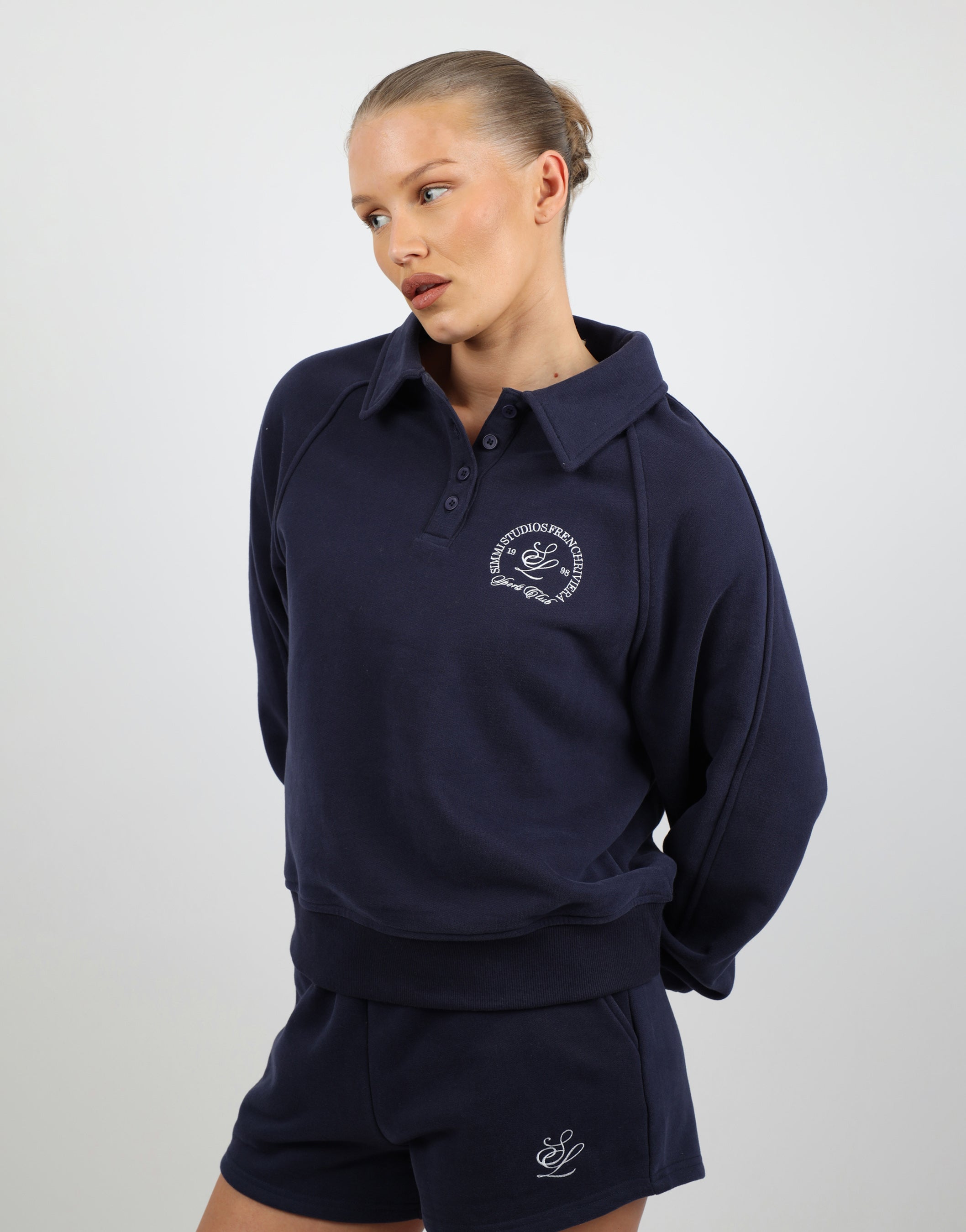 Monaco Simmi Studios Embroidered Logo Polo Sweatshirt In Navy