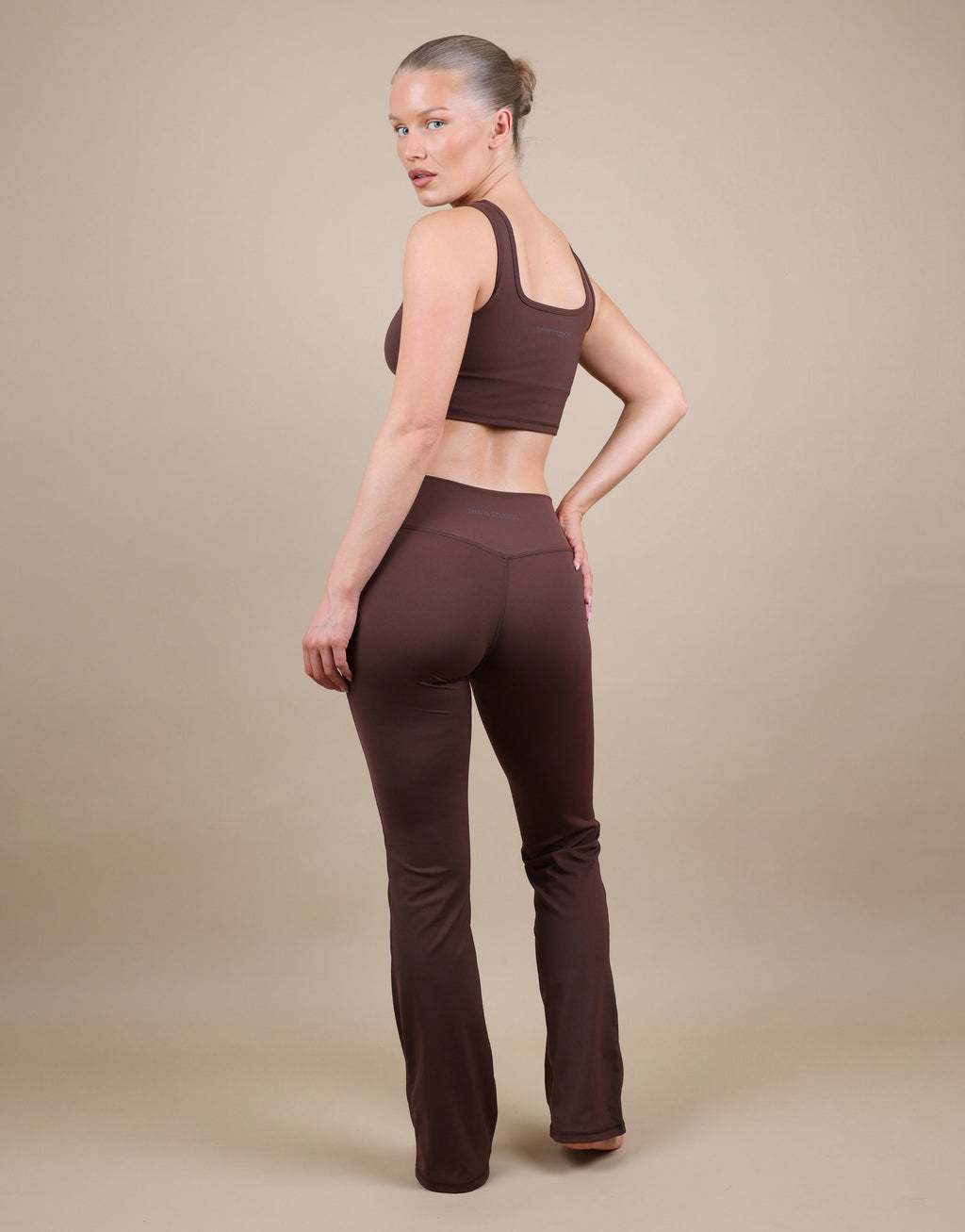 Cleo Ruched Front Flared Leggings In Brown