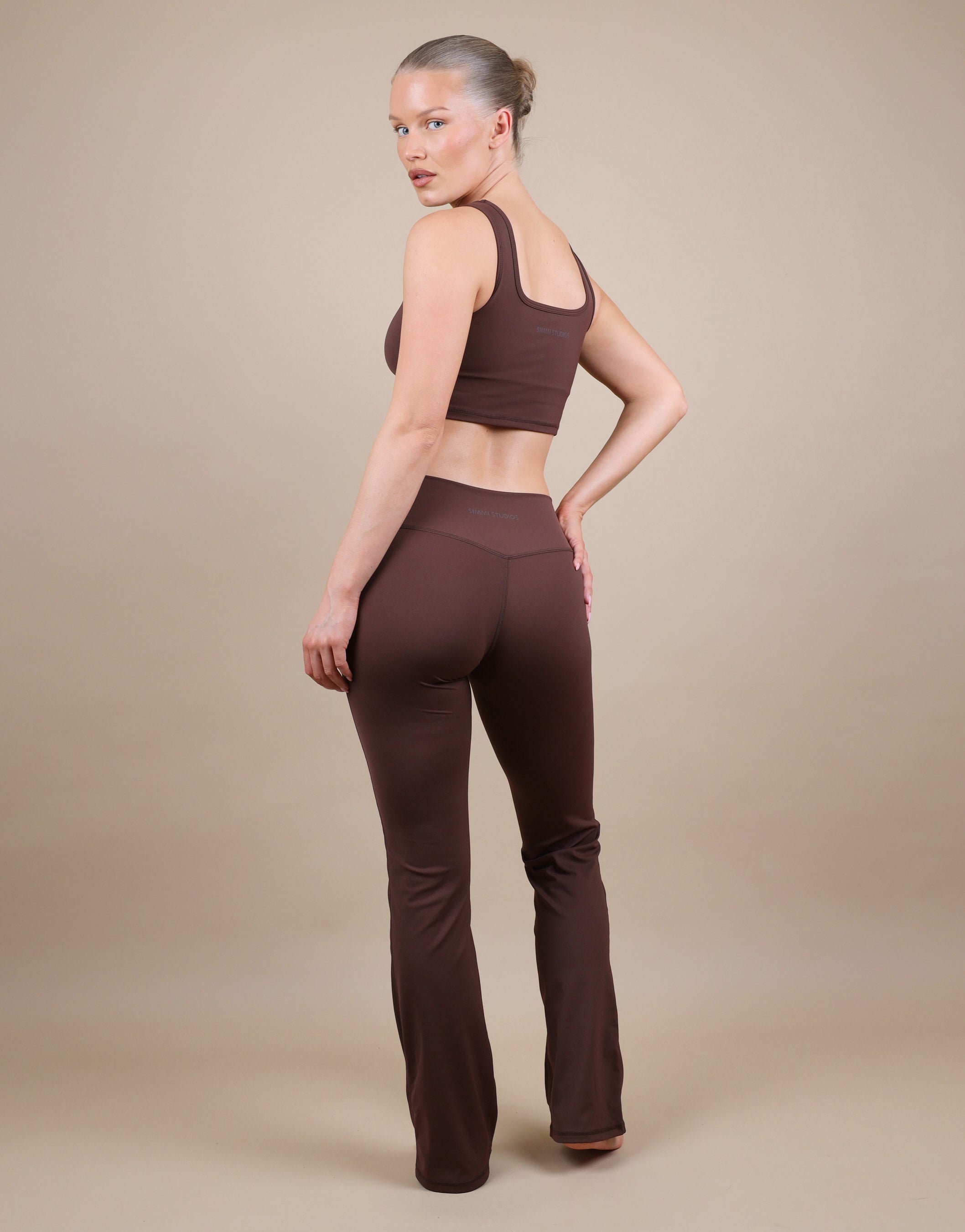 Cleo Ruched Front Flared Leggings In Brown