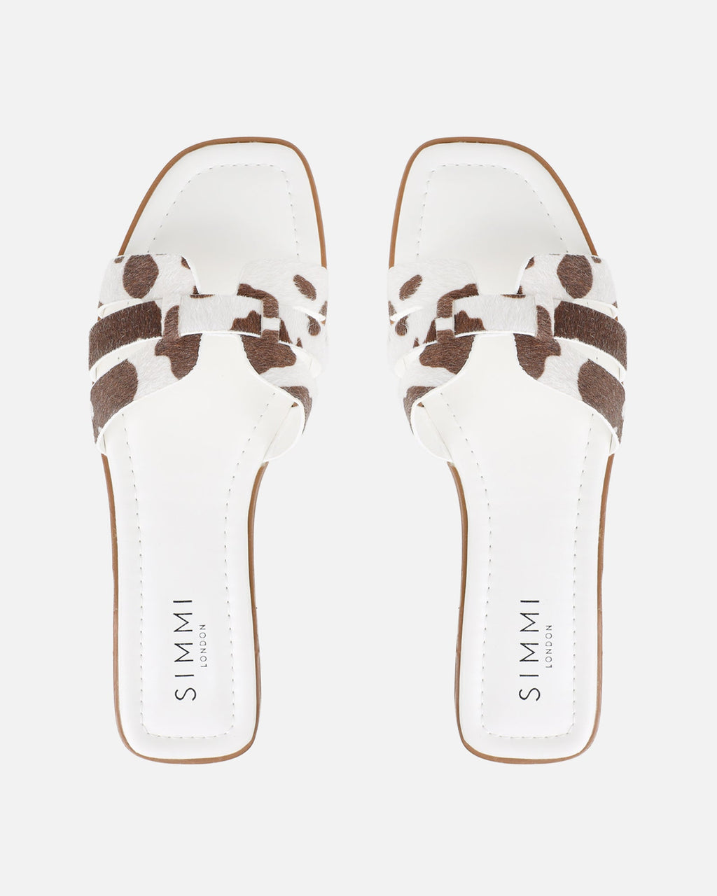 Jorja Cow Print Slip On Flat Sandals