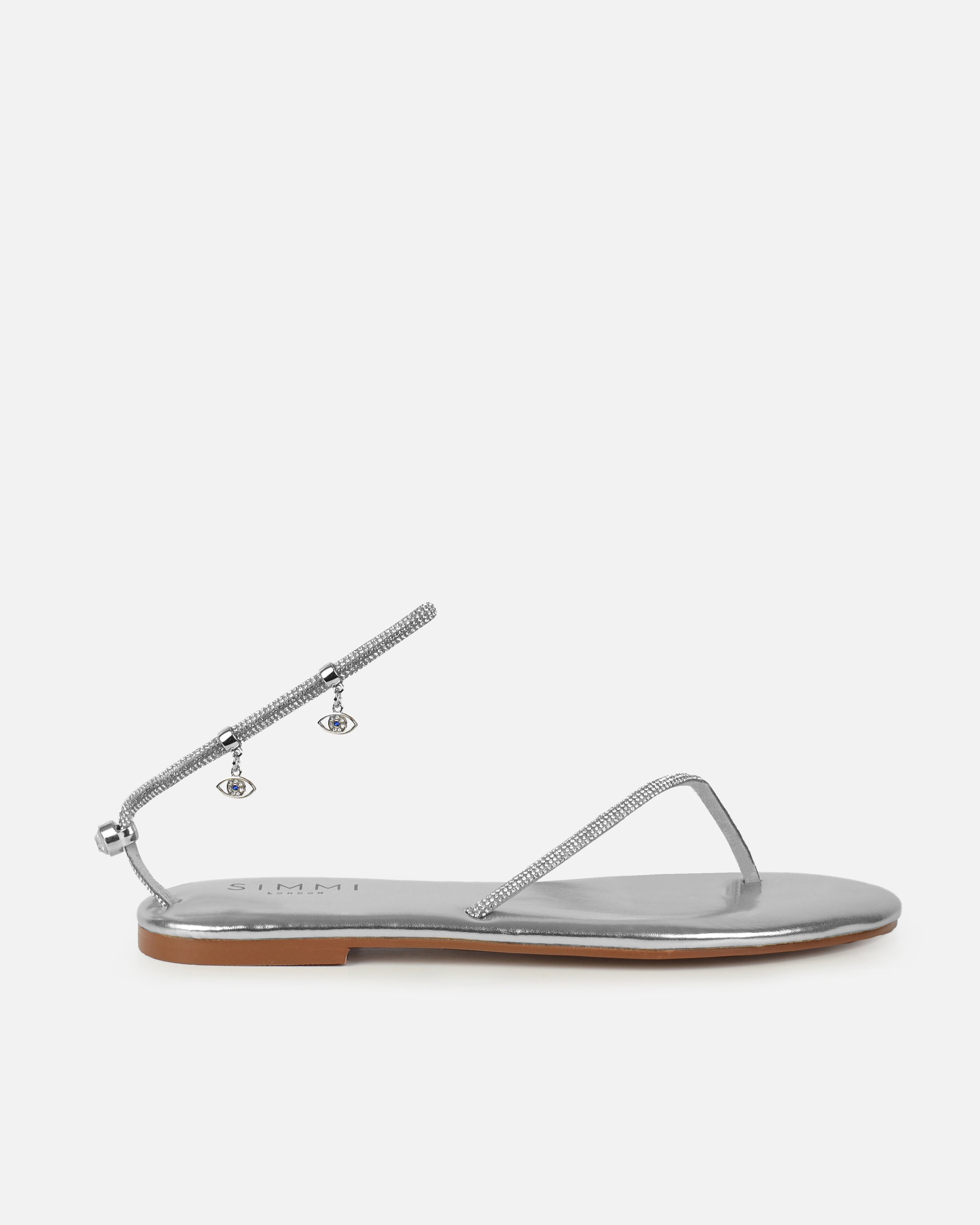 Dakoa Silver Metallic Evil Eye Charm Flat Sandals